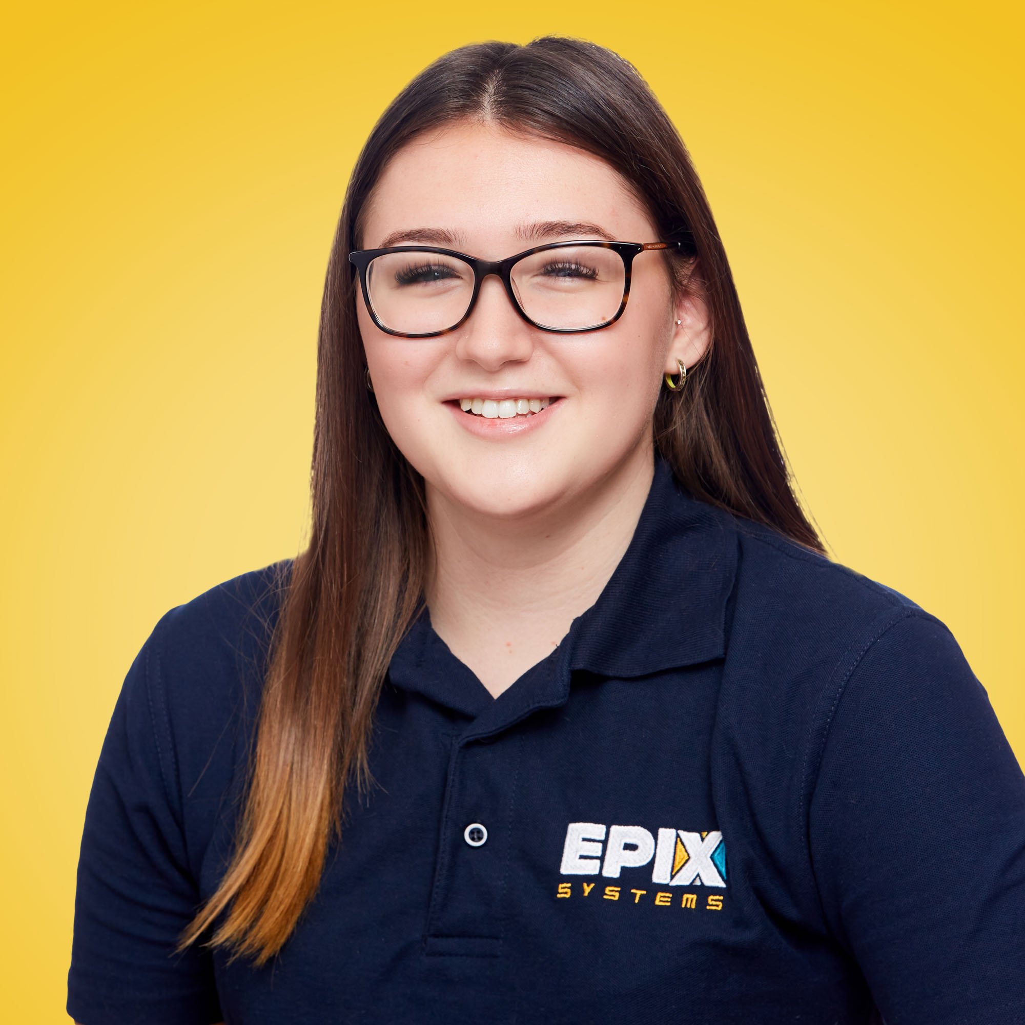 Ella in a dark blue EPIX shirt against a yellow background