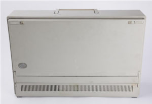 Photo of an IBM portable computer packed up