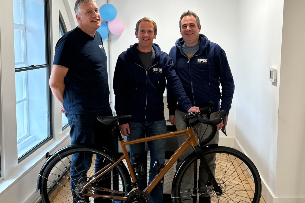 Ian, Chris and Ian with Chris's shiny new bike